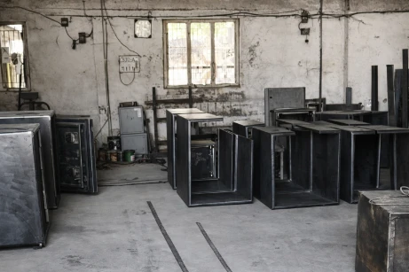 Open safe frames and fabricated units inside the Jay Safe workshop